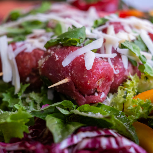 Involtini di vitello con rucola, speck e grana